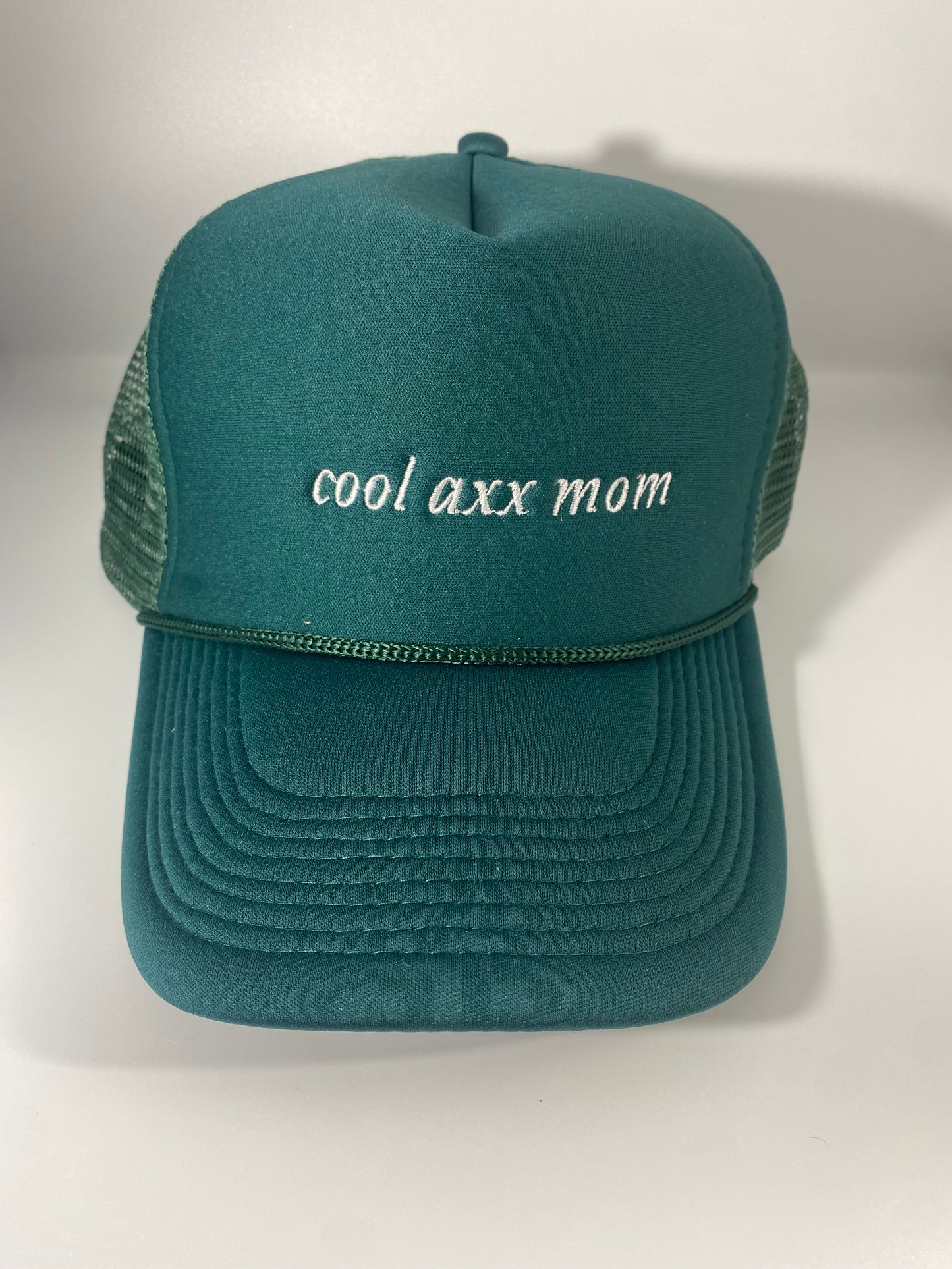 cool axx mom deep green trucker